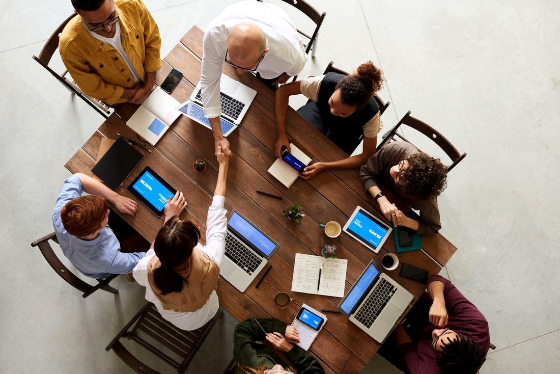 Accountants working together at a client meeting